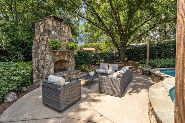 110 Lynbrook Dr, Davidson, NC 28036 - view of patio / terrace with an outdoor living space with a fireplace