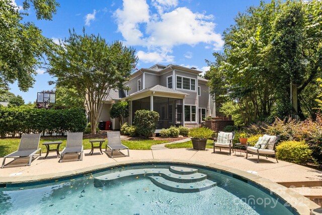 110 Lynbrook Dr, Davidson, NC 28036 - swimming pool with a sunroom and a patio