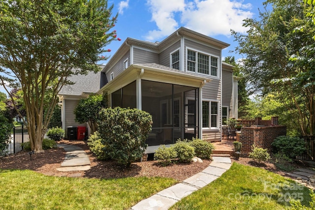 110 Lynbrook Dr, Davidson, NC 28036 - rear view of house featuring a sunroom