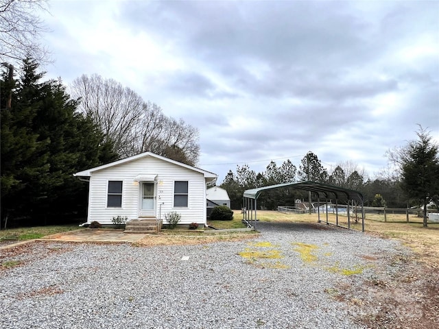 view of front facade featuring a carport