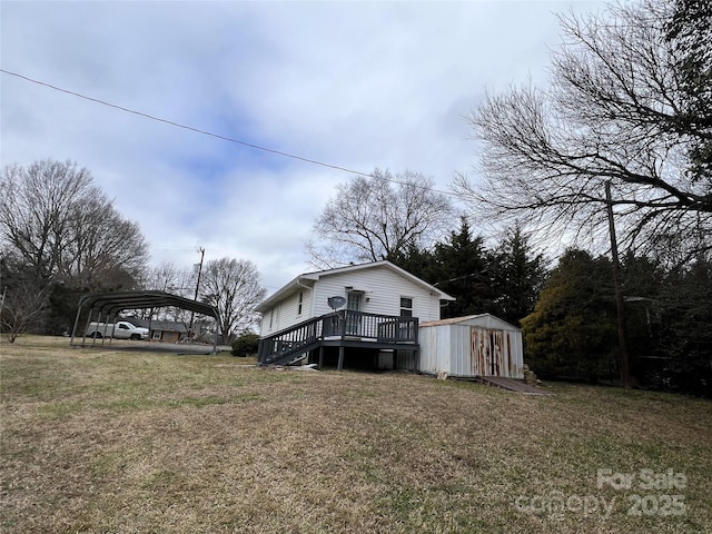 view of home's exterior featuring a storage shed, a lawn, a carport, and a deck