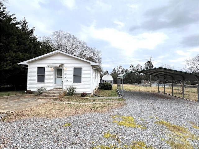 view of front of house featuring a carport