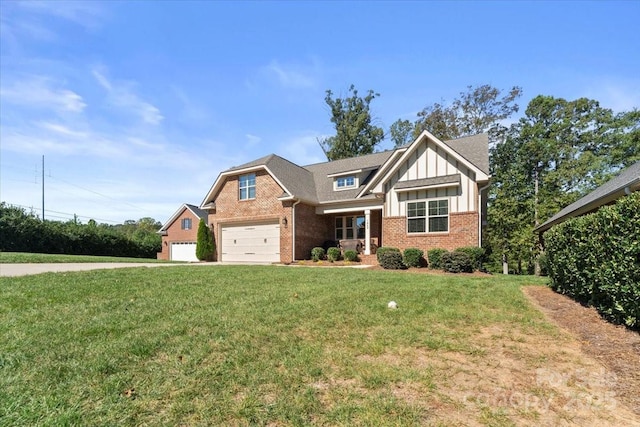 craftsman-style home featuring a garage and a front yard