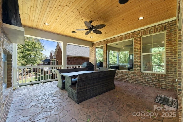 view of patio featuring ceiling fan