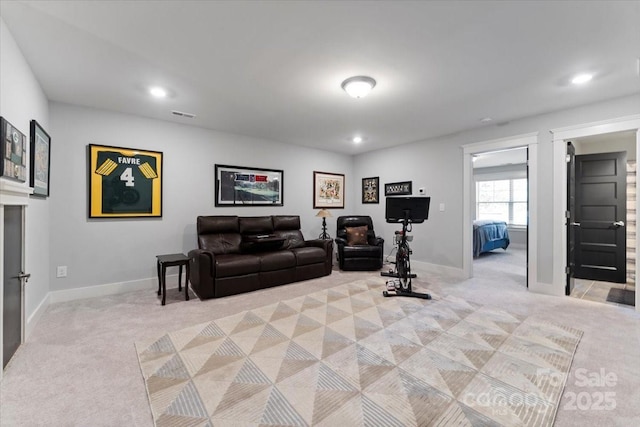 living room featuring light carpet