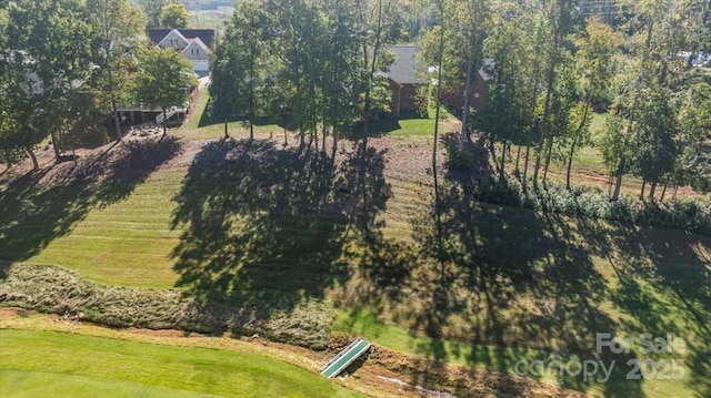 birds eye view of property featuring a rural view