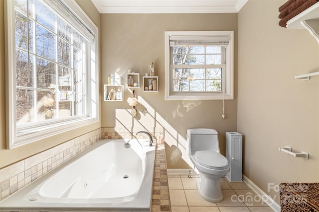 full bath with toilet, tile patterned floors, crown molding, and a whirlpool tub
