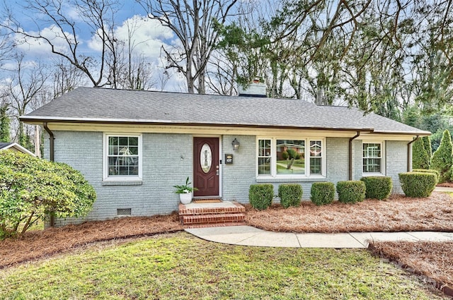 single story home with a front yard