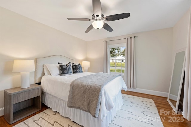 bedroom featuring ceiling fan and light hardwood / wood-style floors