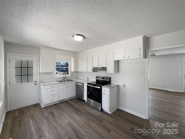 kitchen featuring white cabinetry, sink, dark hardwood / wood-style flooring, and appliances with stainless steel finishes