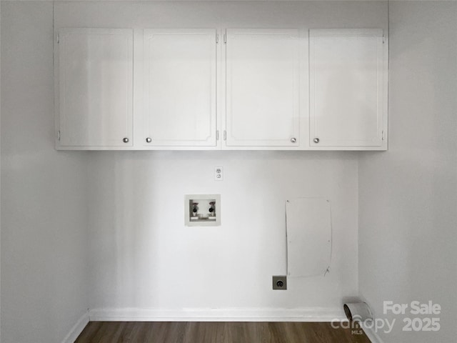 washroom featuring washer hookup, cabinets, dark hardwood / wood-style floors, and hookup for an electric dryer