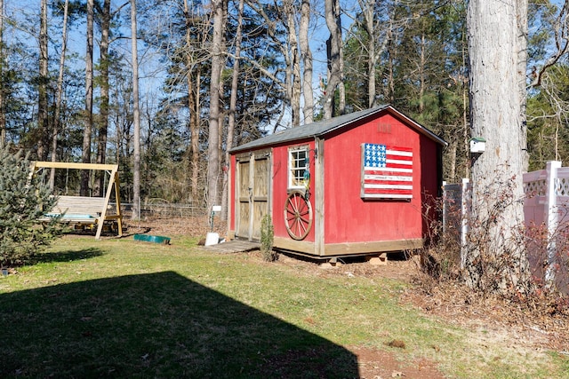 view of outdoor structure featuring a yard