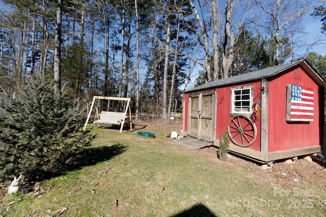 view of outdoor structure featuring a yard