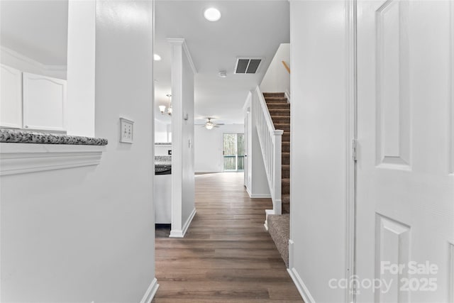 corridor featuring wood-type flooring