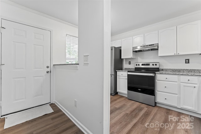 kitchen with ornamental molding, appliances with stainless steel finishes, dark hardwood / wood-style floors, and white cabinets