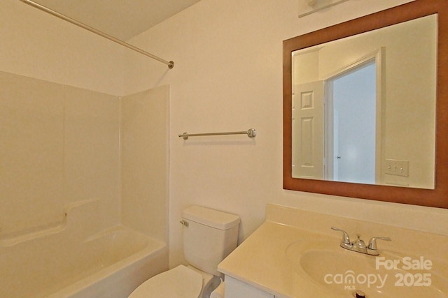 full bathroom with shower / bathtub combination, vanity, and toilet