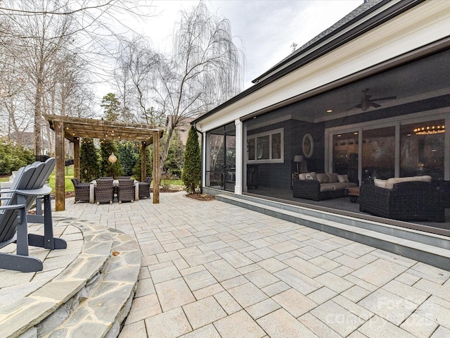 view of patio / terrace with a pergola, an outdoor hangout area, and a sunroom