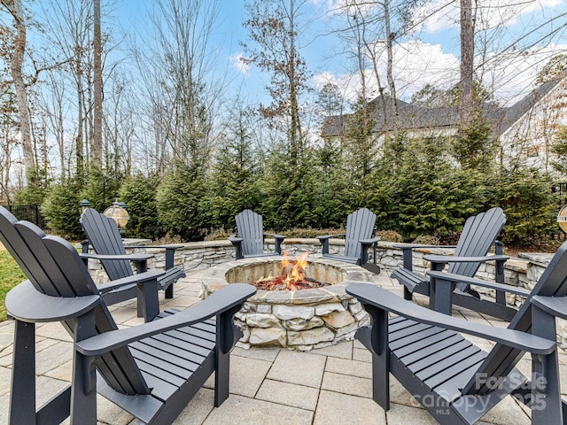 view of patio / terrace featuring a fire pit