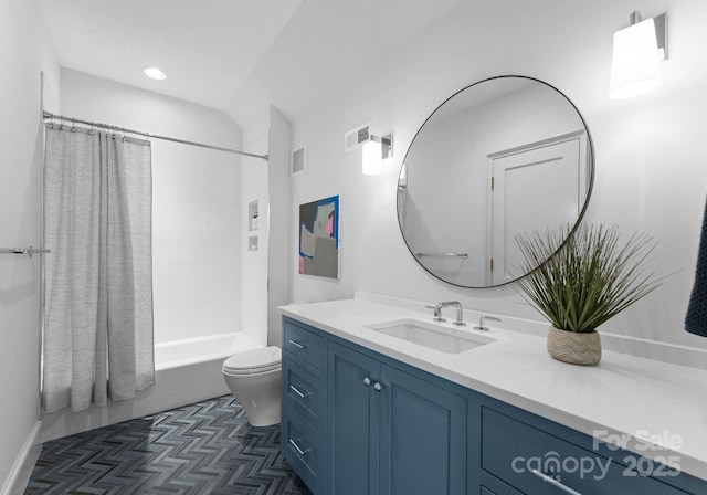 full bathroom featuring shower / bath combination with curtain, vanity, and toilet