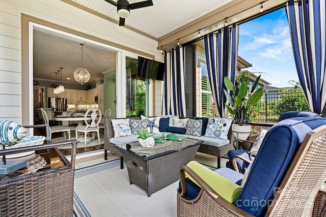 view of patio featuring ceiling fan and an outdoor hangout area