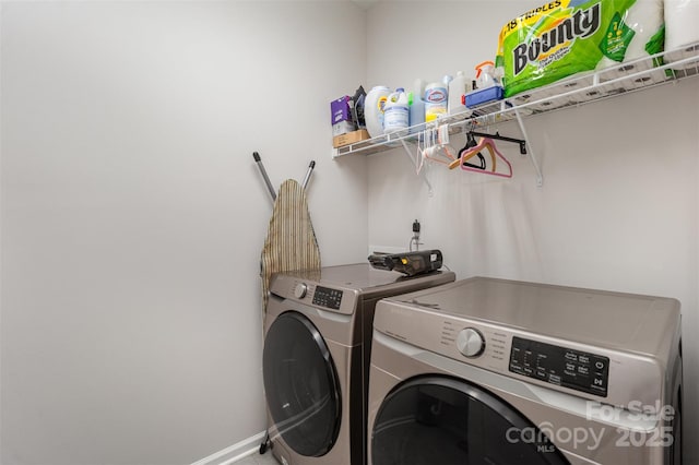 laundry room featuring separate washer and dryer