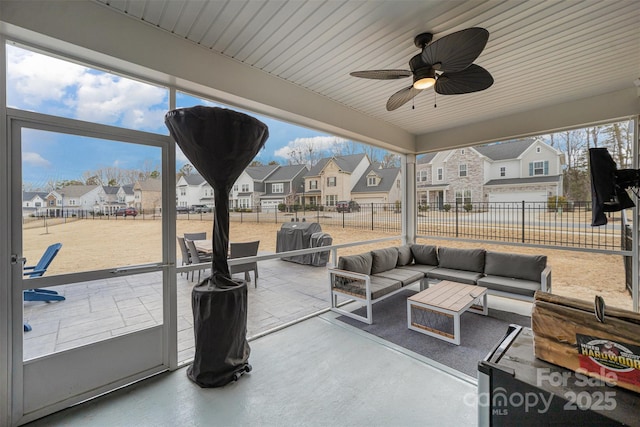 view of patio with area for grilling, an outdoor hangout area, and ceiling fan