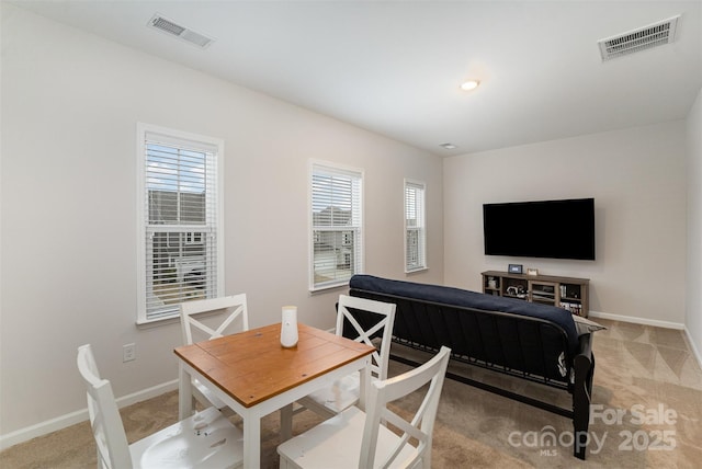 view of carpeted dining room