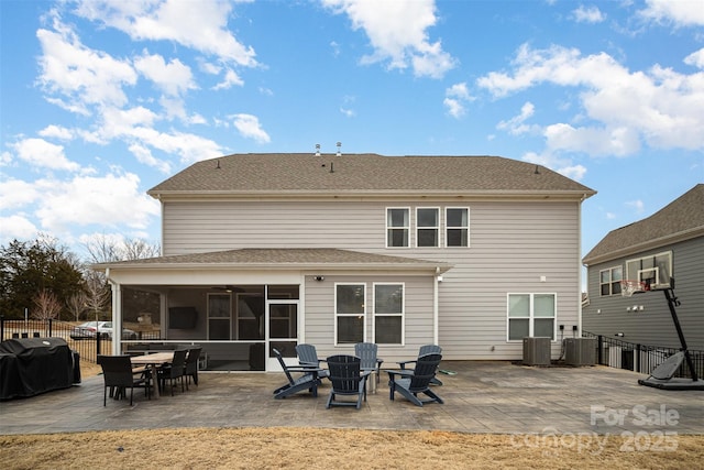 back of house with a patio