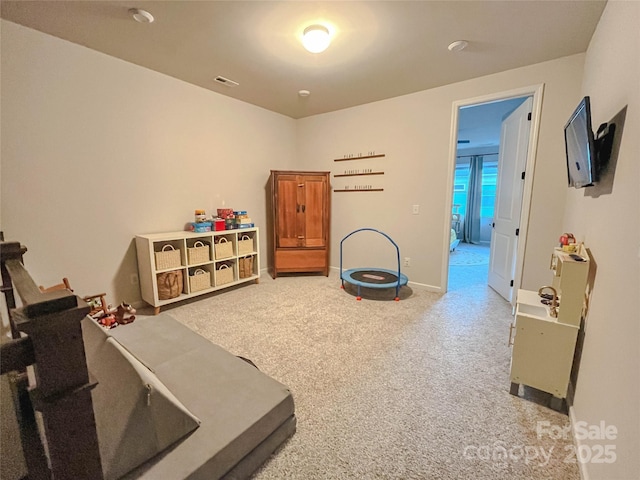 recreation room with carpet floors