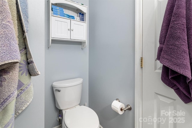 bathroom featuring toilet