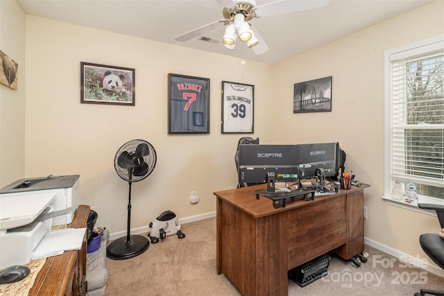 home office with ceiling fan and light colored carpet