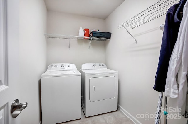 washroom with separate washer and dryer