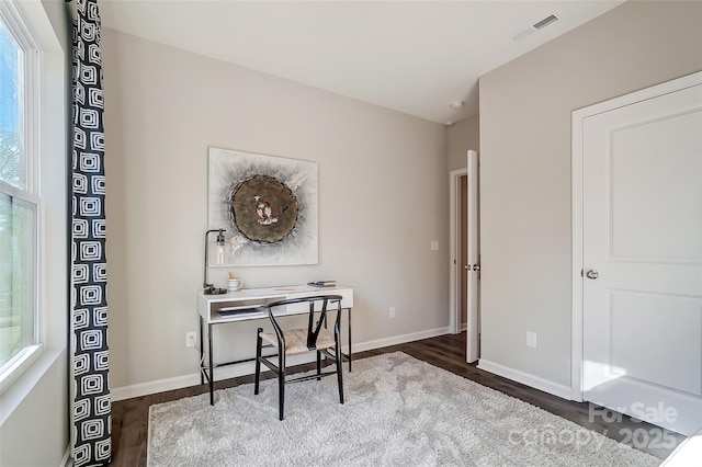 office area with hardwood / wood-style floors