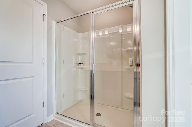 bathroom featuring walk in shower