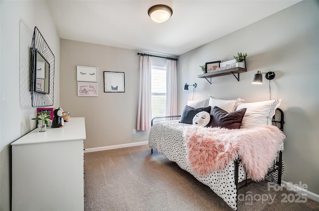 bedroom featuring dark colored carpet