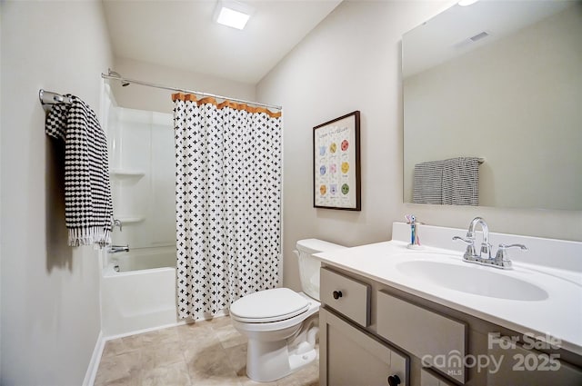 full bathroom with vanity, shower / bath combo, and toilet