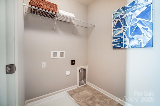 clothes washing area with electric dryer hookup, washer hookup, and gas dryer hookup