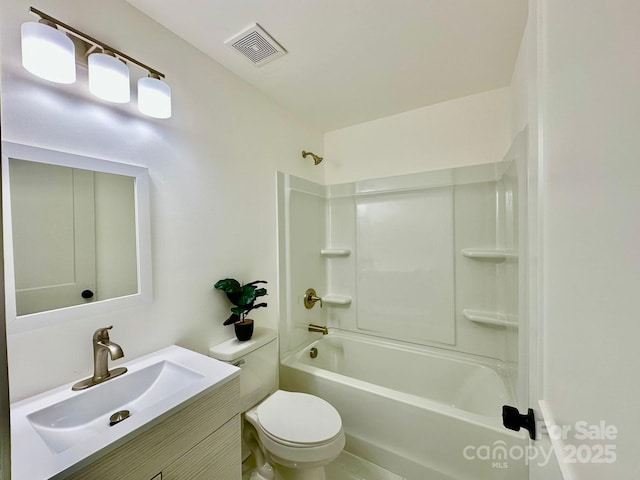 full bathroom featuring shower / tub combination, vanity, and toilet