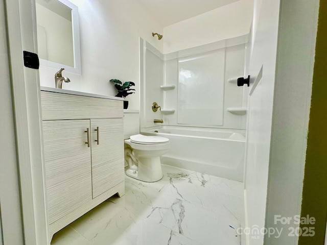 full bathroom with vanity, toilet, and washtub / shower combination