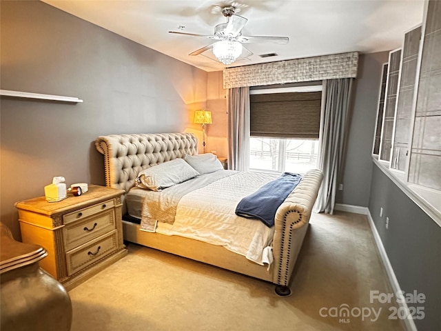 bedroom featuring ceiling fan, light carpet, baseboards, and visible vents