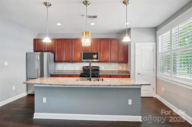 128 Steinbeck Way Unit E, Mooresville, NC 28117 - kitchen featuring appliances with stainless steel finishes, baseboards, backsplash, and dark wood-style flooring