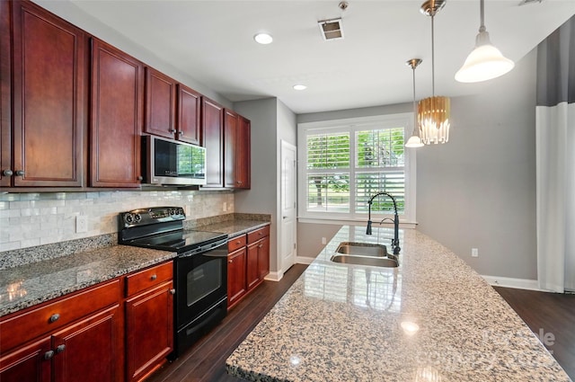 128 Steinbeck Way Unit E, Mooresville, NC 28117 - kitchen featuring black electric range, baseboards, stainless steel microwave, and a sink