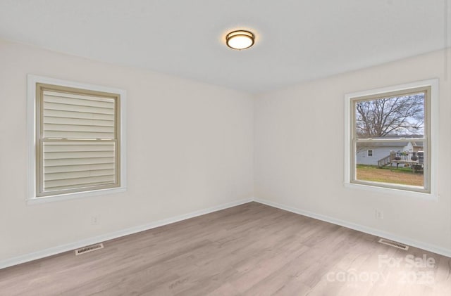 empty room featuring light wood-type flooring