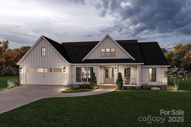 modern farmhouse featuring a garage, a front yard, covered porch, and driveway