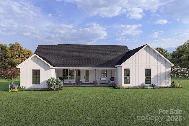 view of front of property with a front yard, board and batten siding, and roof with shingles