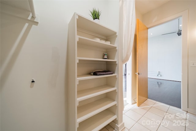 walk in closet featuring light tile patterned floors