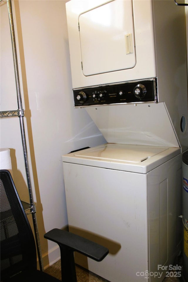 laundry room featuring stacked washer and dryer