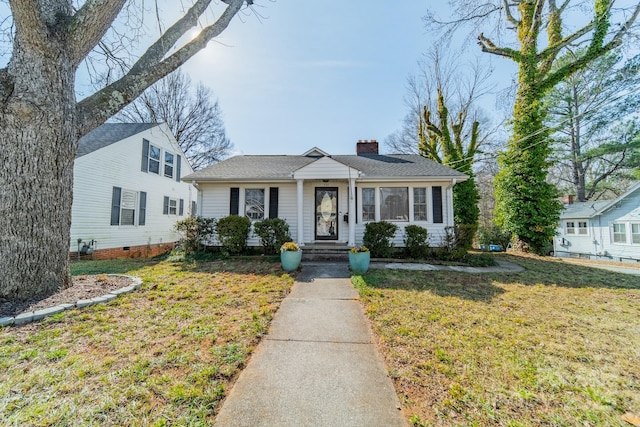 view of front of home with a front yard