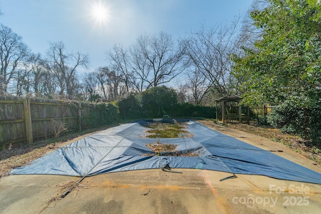 view of pool featuring a gazebo