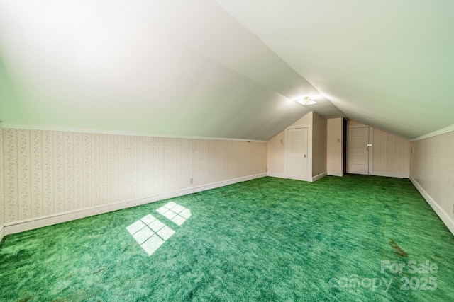531 Elm St, Salisbury, NC 28144 - bonus room with carpet floors, wallpapered walls, vaulted ceiling, and baseboards
